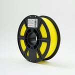 Standard PLA Matte Yellow 1.75mm filament on a plastic spool